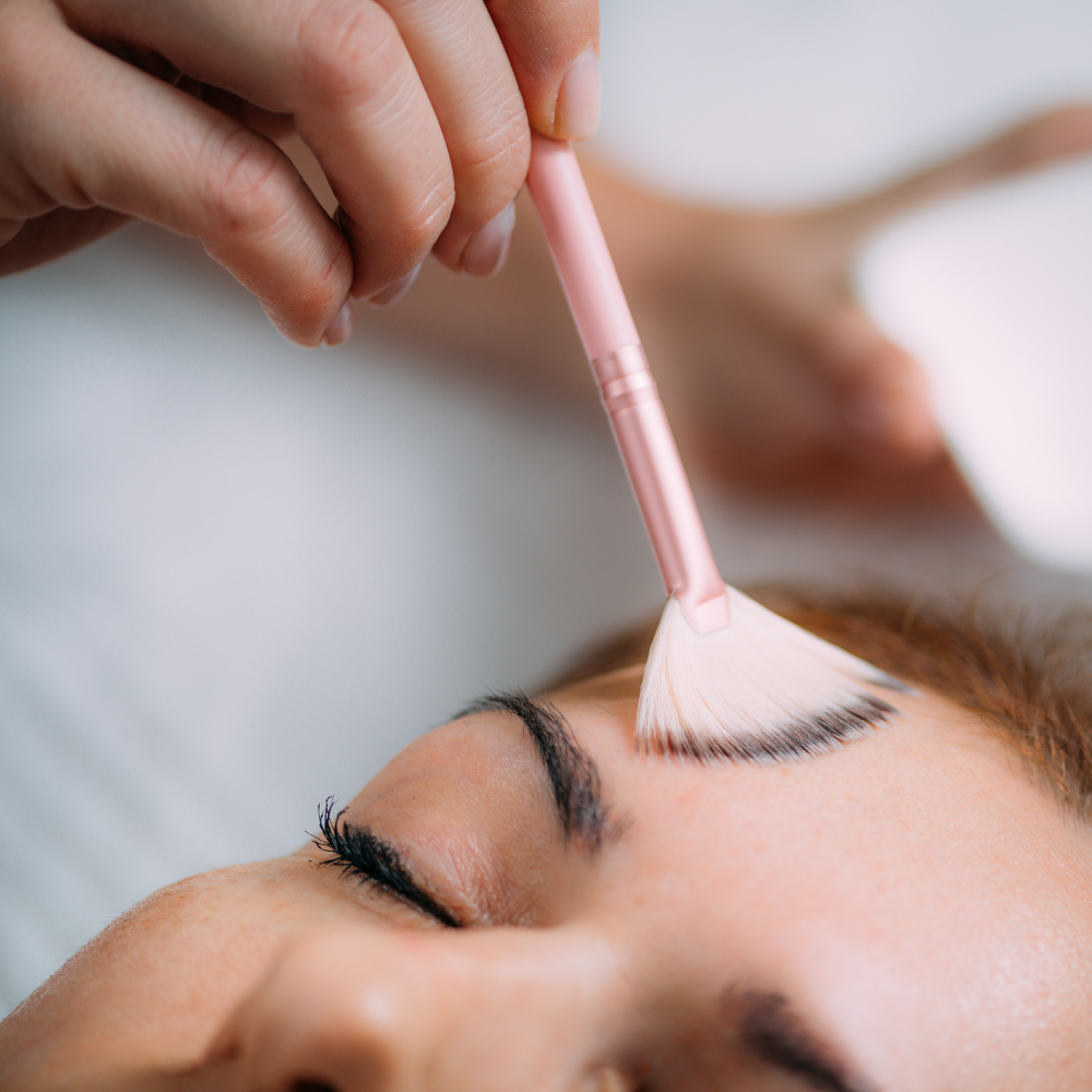 Woman receiving chemical peel