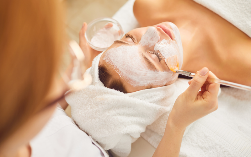 Woman receiving a chemical peel